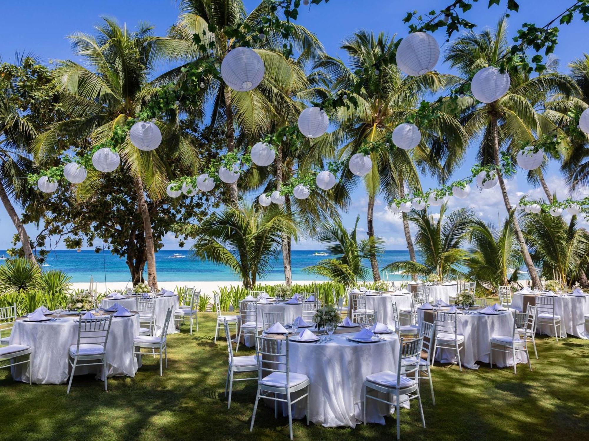 Movenpick Resort & Spa Boracay Yapak Exterior photo A wedding reception at the beach