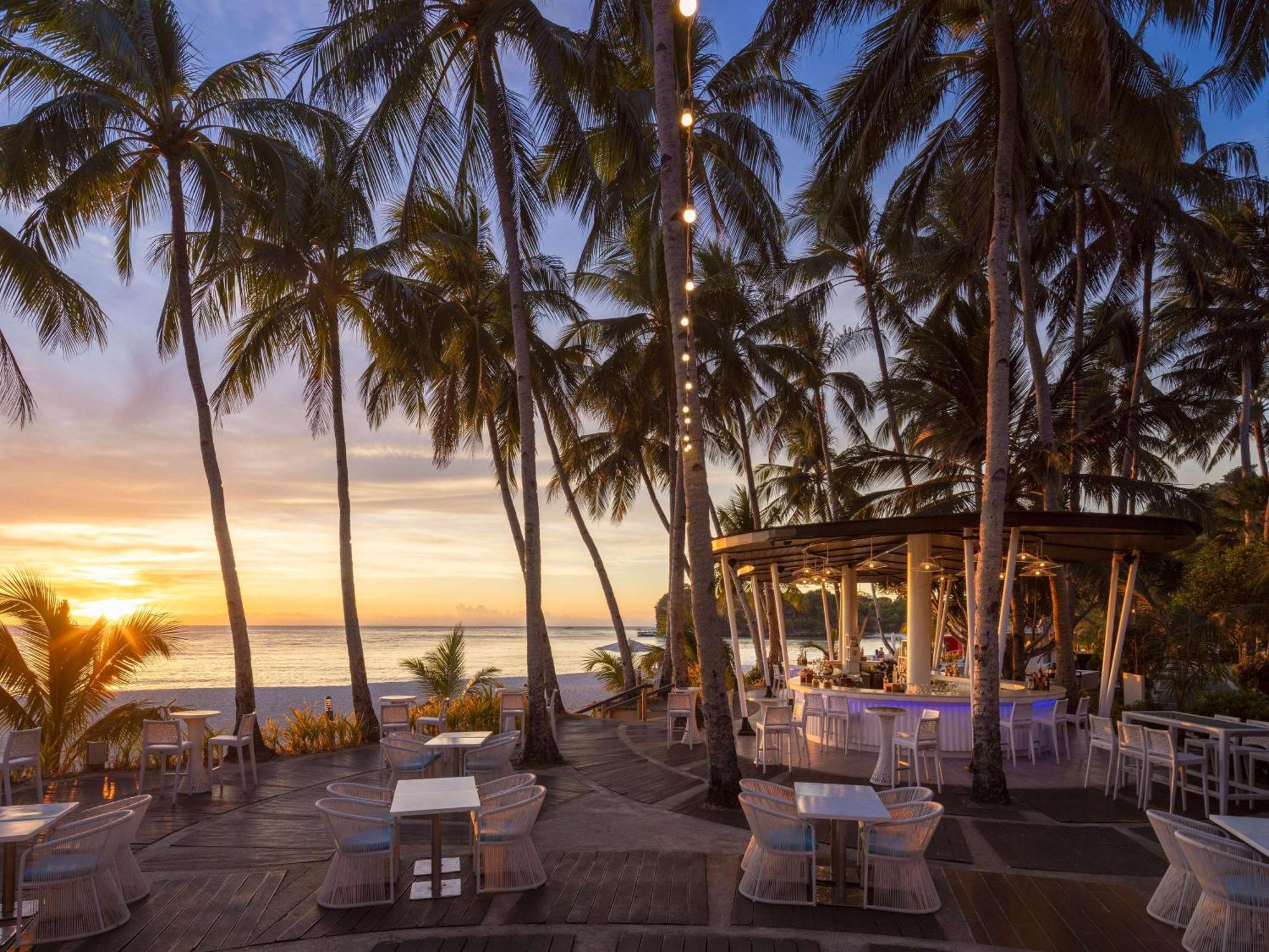 Movenpick Resort & Spa Boracay Yapak Exterior photo Sunset at the beach bar